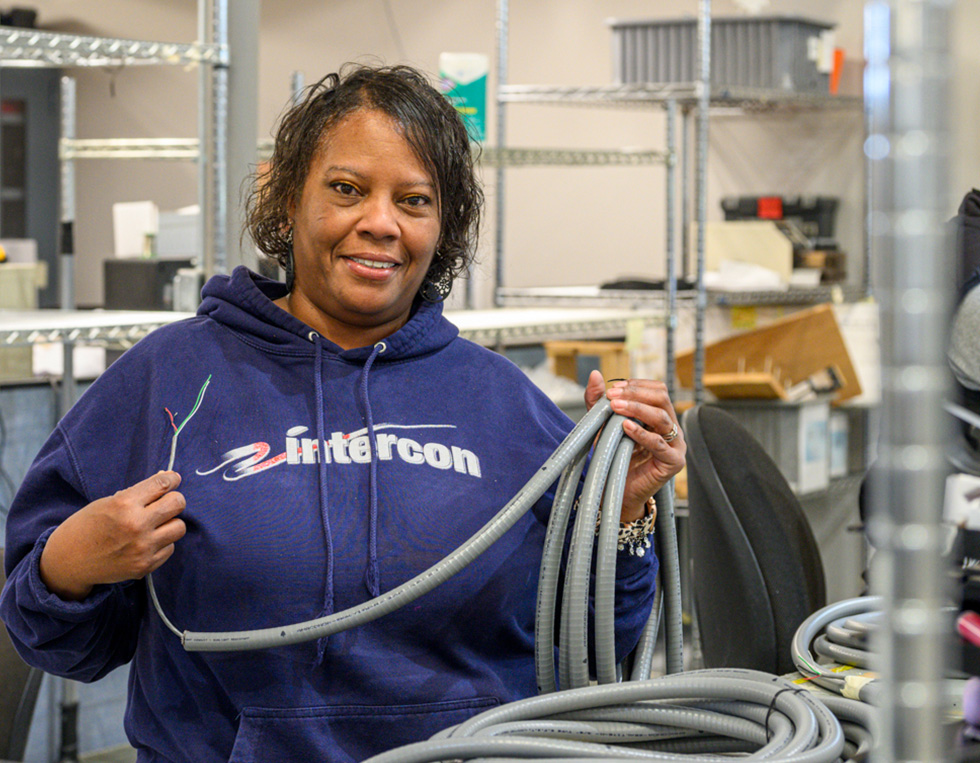 happy intercon inc cable assembly employee smiling in forest va